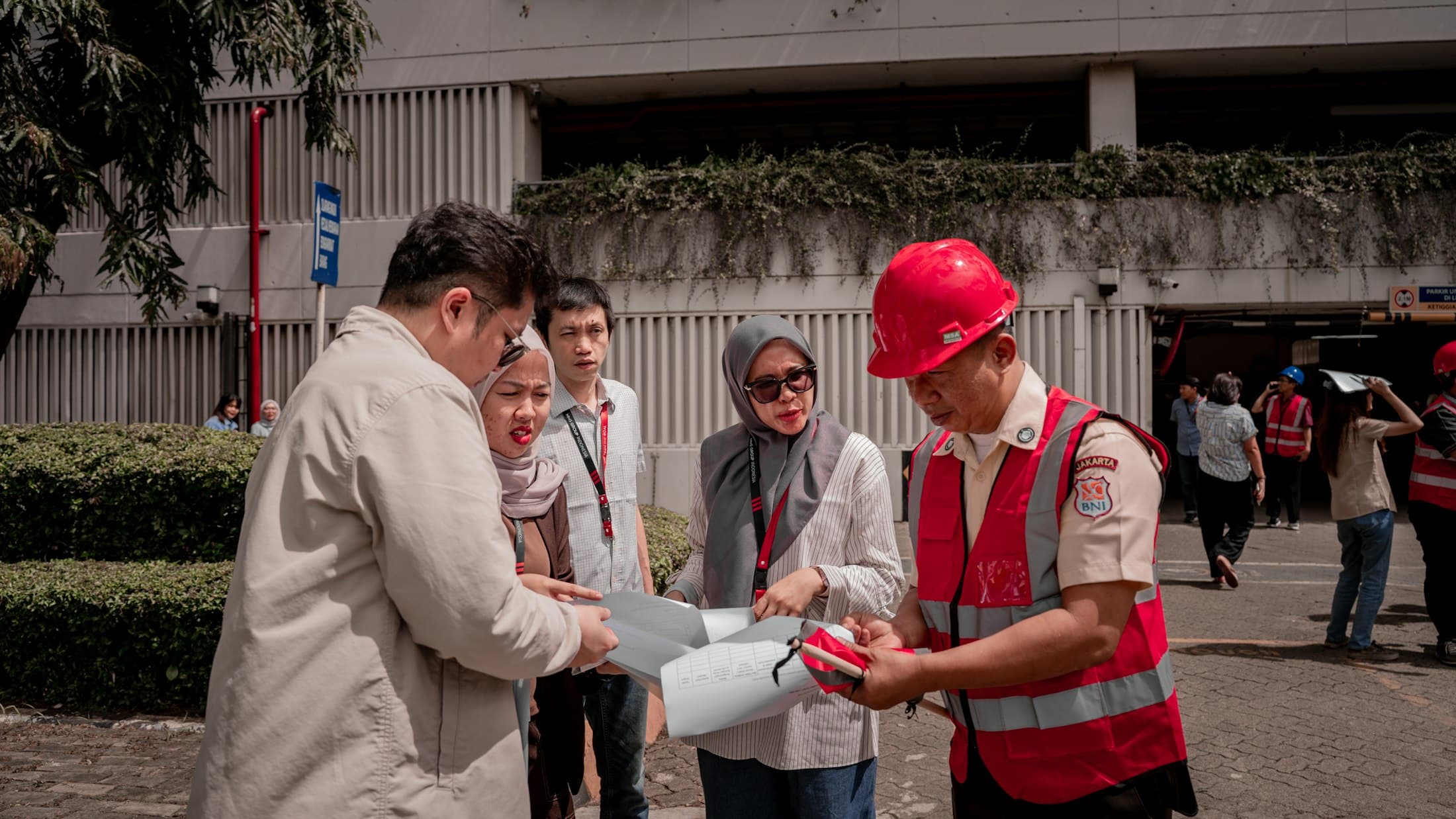 Engineers reviewing drawings together on a project site